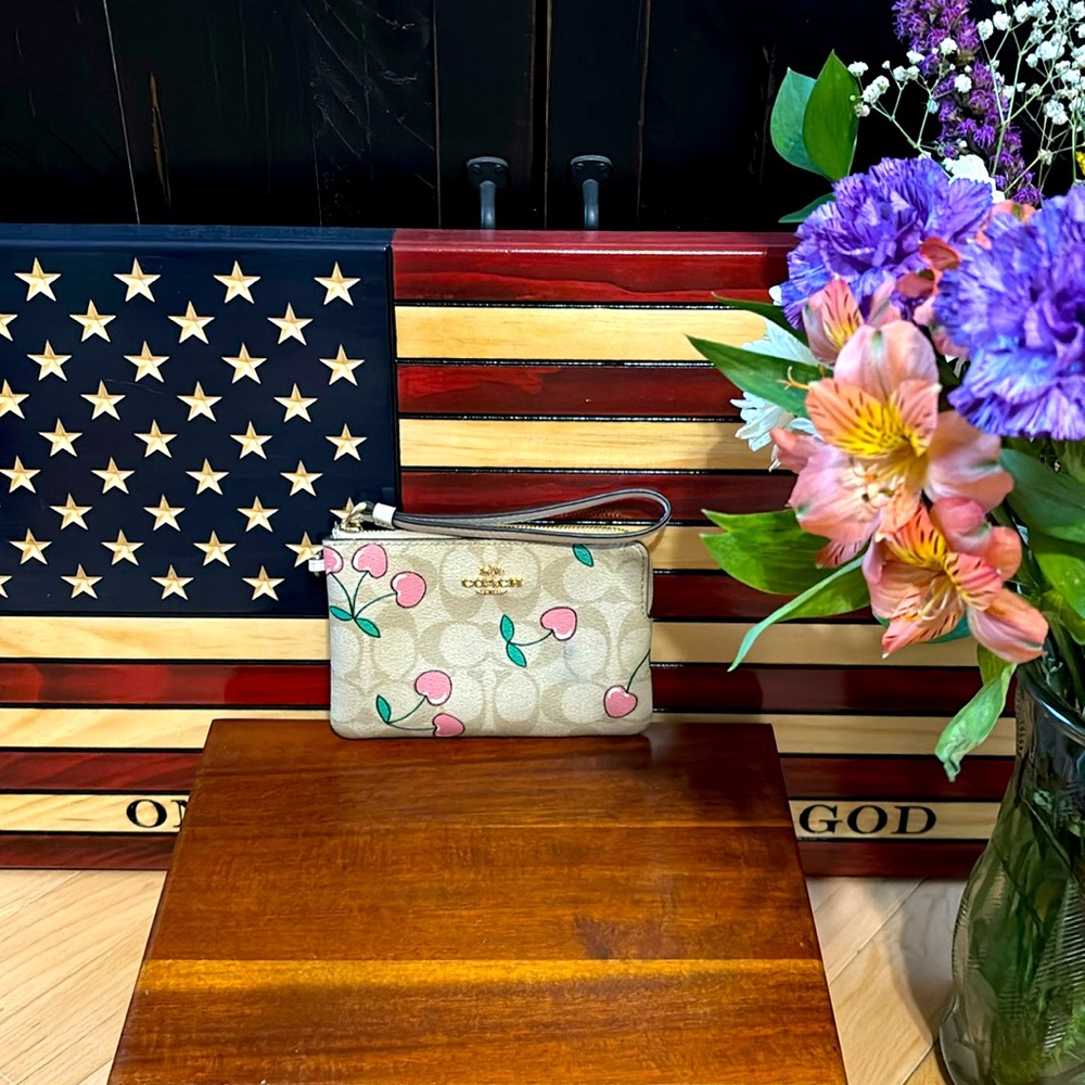 Coach cherry wristlet🍒